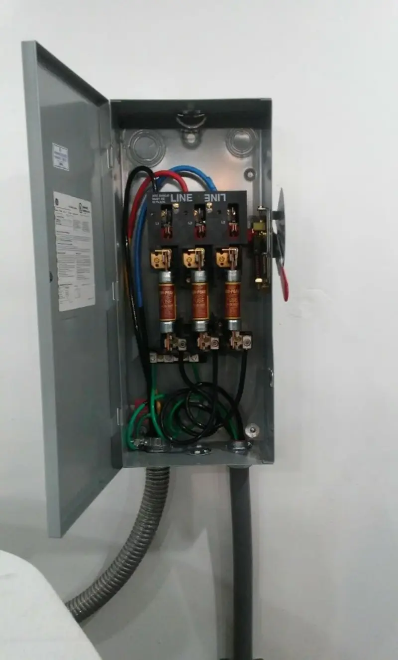 Three-phase disconnect switch installed for Smoke Detector Installation in Flat Rock