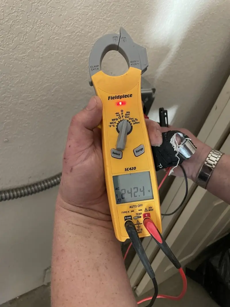 Voltage testing with clamp meter during Ceiling Fan Installation in Flat Rock